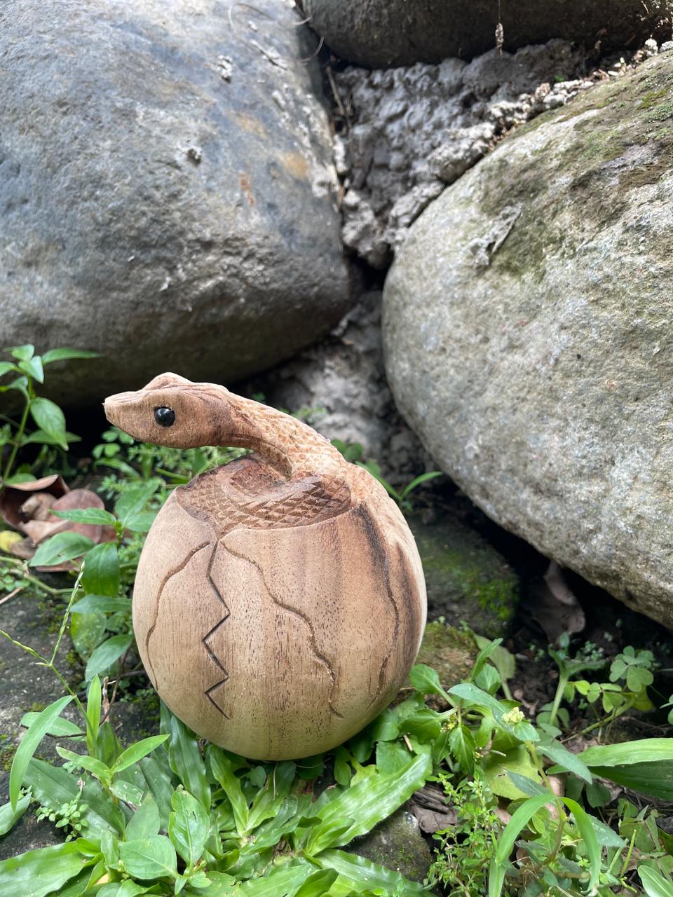 Handcrafted snake wood carving